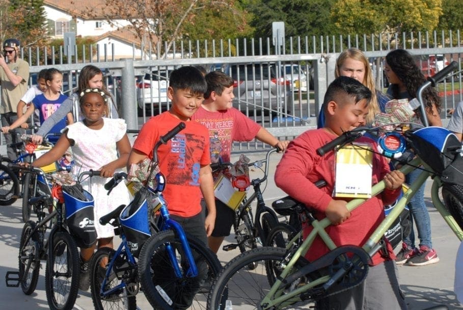 Jenson USA Supports East Hills Holiday Bicycle Giveaway to Sixty Students